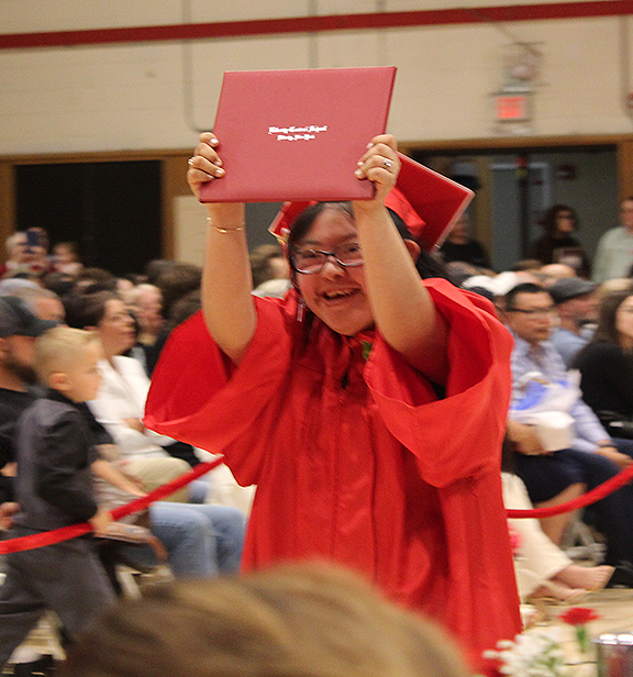 graduation9 A student hold up her diploma
