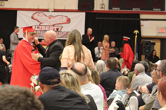 graduation7 A student gets a hug rom an audience member
