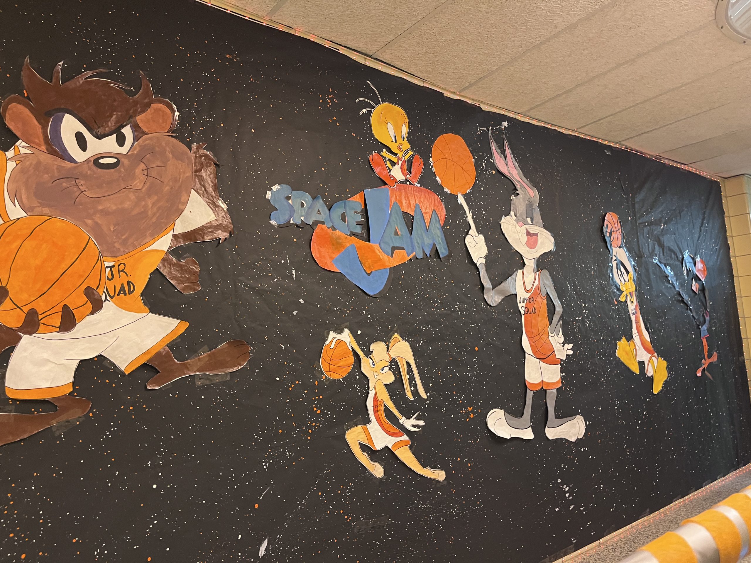 Characters from Space Jam are on a billboard