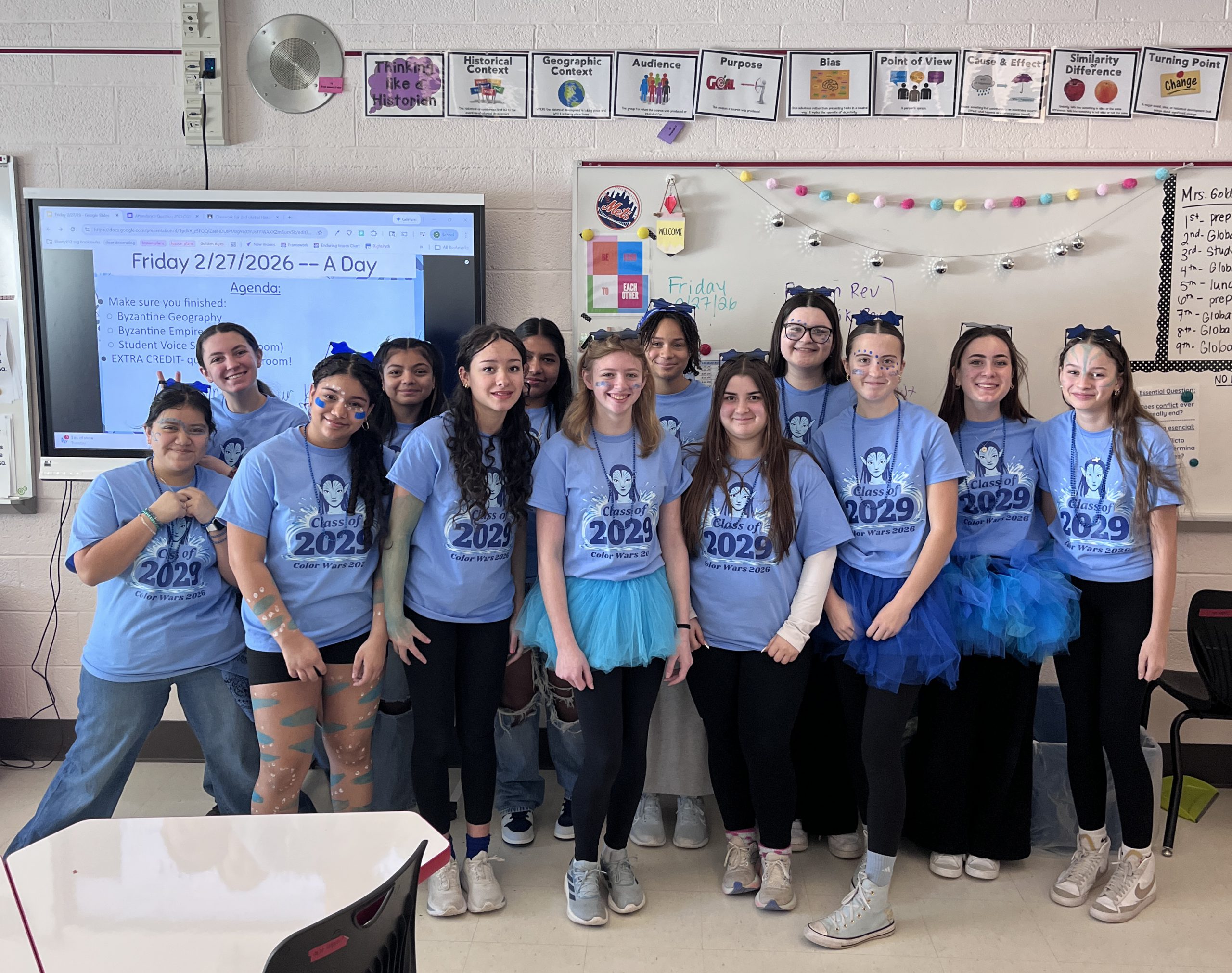 Students pose with their Class of 2029 blue T-shirts